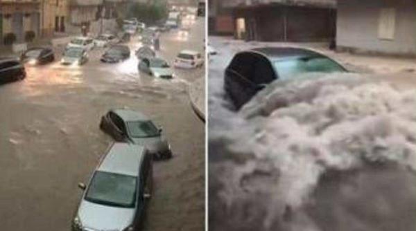 mama a trei copii luata de ape in timpul inundatiilor din italia video