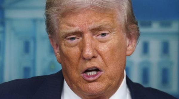 fata lui trump pe o moneda de 1 dolar nu s a mai intamplat de un secol