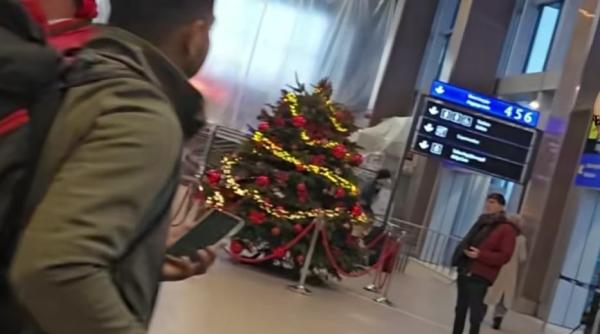 cuplu din moldova dezamagit de cum e decorat aeroportul otopeni inainte de craciun comparatie cu aeroportul chisinau am ajuns in europa video