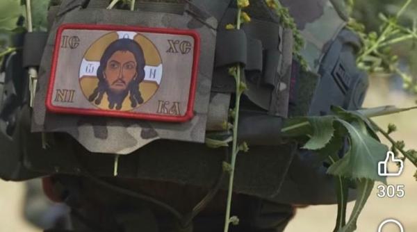 cum icoana de pe casca unui soldat roman a dat nastere unui scandal armata a sters filmuletul