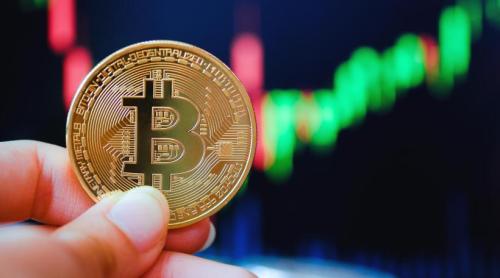 Bitcoin depășește pragul de 64.000 de dolari